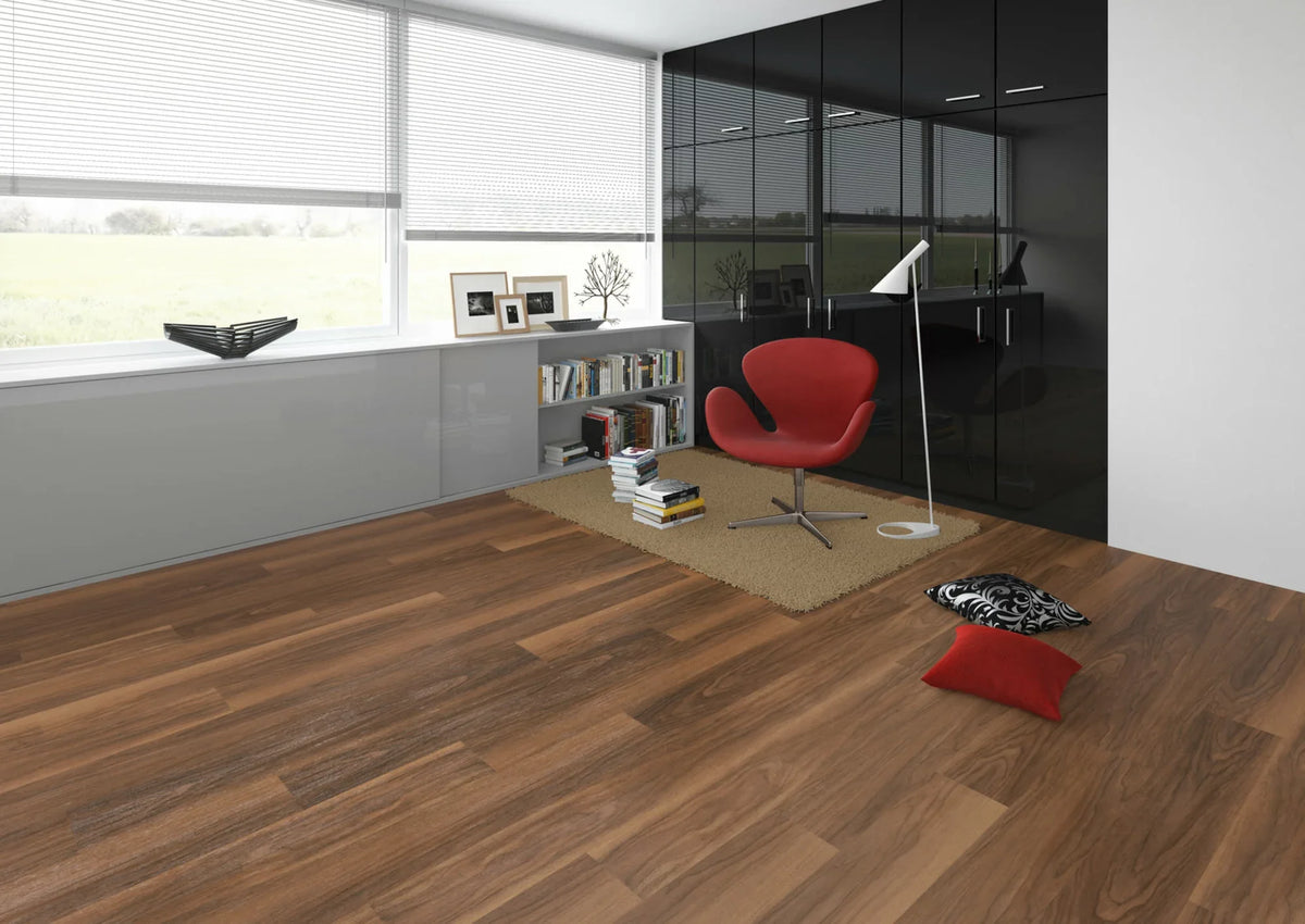 JOKA Design 340 Dryback 2857 Classic Nuttree Klebevinyl im Arbeitszimmer mit rotem Sessel, Glaswand und weißem Einbauschrank