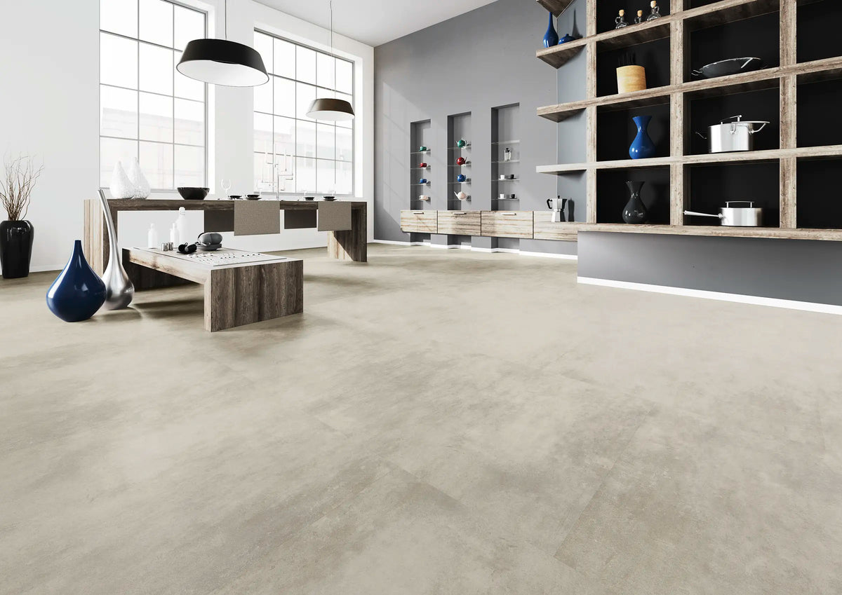 JOKA Design 555 Dryback 5609 Patchy Concrete Klebevinyl in einem hellen modernen Wohnraum mit grauer Betonoptik
